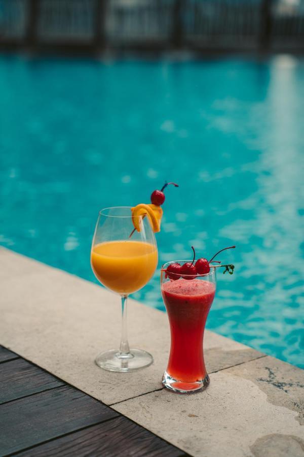 St Giles Gardens Hotel Kuala Lumpur Exterior photo A mango lassi (left) and a strawberry lassi (right)